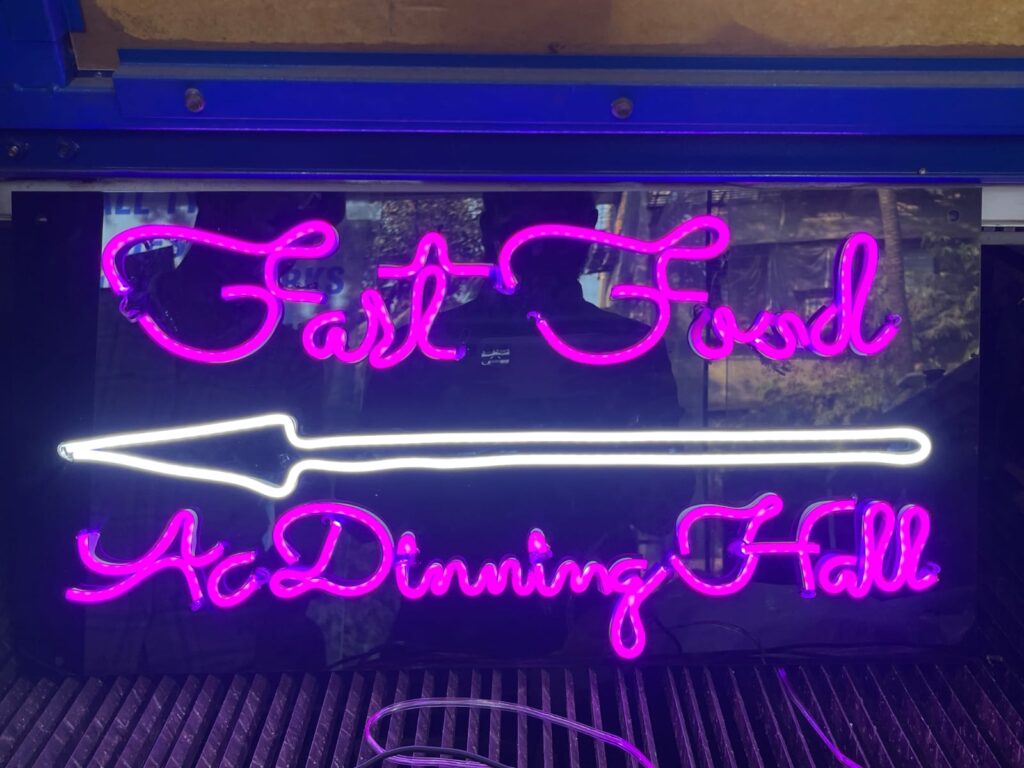 Pink white neon sign for fast food restaurant Mumbai by Arrow Advertising