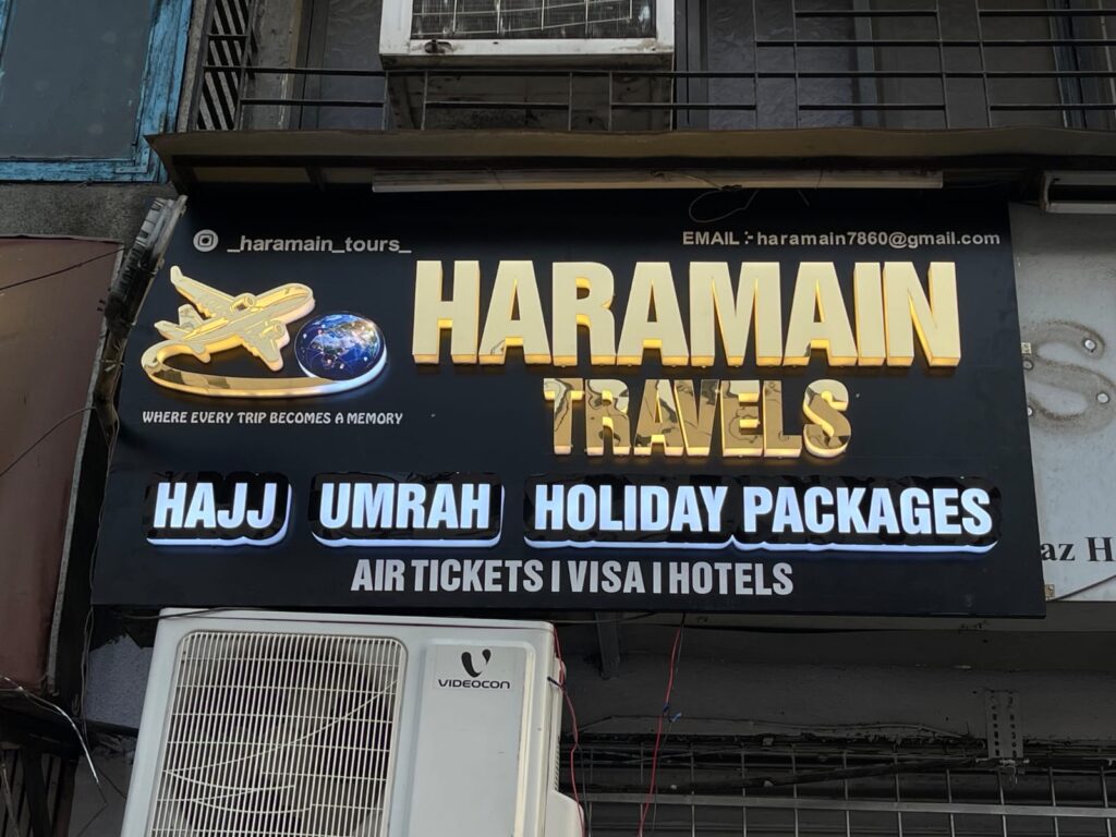 Gold LED backlit sign for travel agency Mumbai by Arrow Advertising
