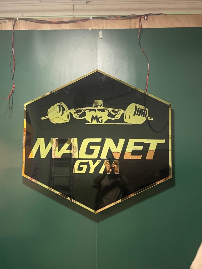 Hexagonal 3D acrylic gold black gym logo sign Mumbai by Arrow Advertising