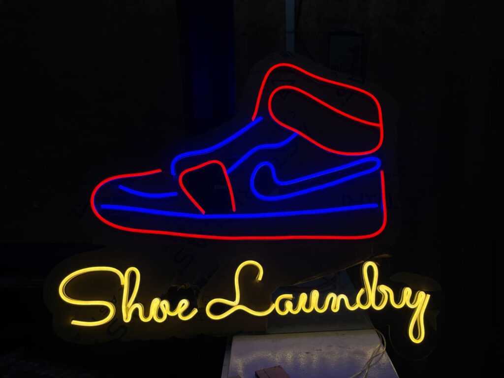 Colourful neon sign for shoe laundry shop Mumbai by Arrow Advertising